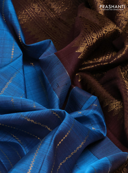 Pure kanchipuram silk saree blue and coffee brown with allover zari stripe pattern and long zari woven border