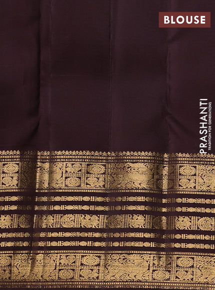 Pure kanchipuram silk saree blue and coffee brown with allover zari stripe pattern and long zari woven border