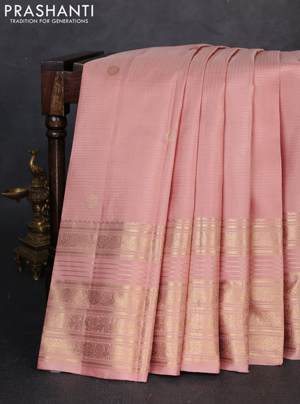Pure kanchipuram silk saree peach shade with allover zari checks & buttas and long zari woven border