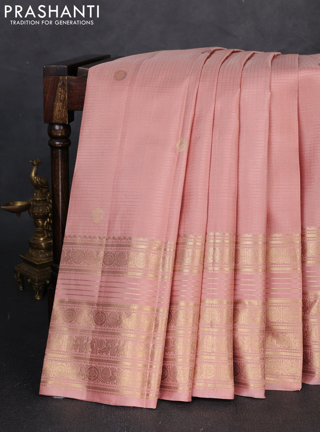 Pure kanchipuram silk saree peach shade with allover zari checks & buttas and long zari woven border