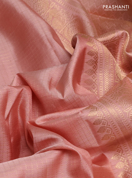 Pure kanchipuram silk saree peach shade with allover zari checks & buttas and long zari woven border