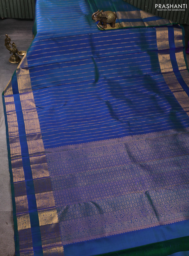 Pure kanchipuram silk saree dual shade of green with allover zari stripe pattern and rettapet zari woven border