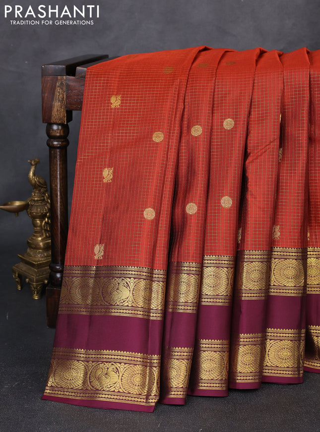 Pure kanchipuram silk saree rust shade and wine shade with allover small checks & buttas and long rettapet zari woven border