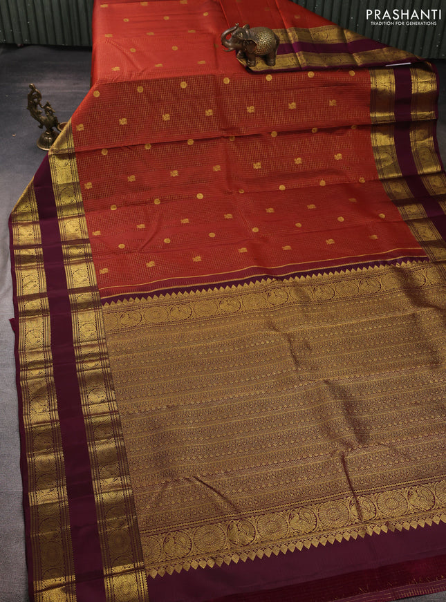 Pure kanchipuram silk saree rust shade and wine shade with allover small checks & buttas and long rettapet zari woven border