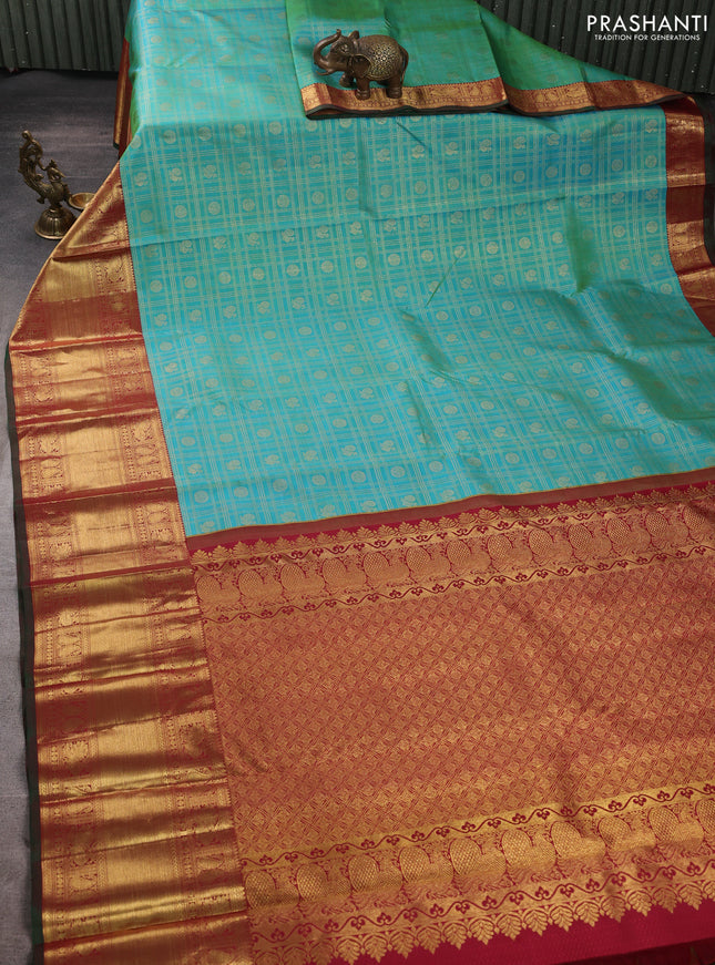 Pure kanchipuram silk saree teal green and green with allover zari checks & buttas and long zari woven border