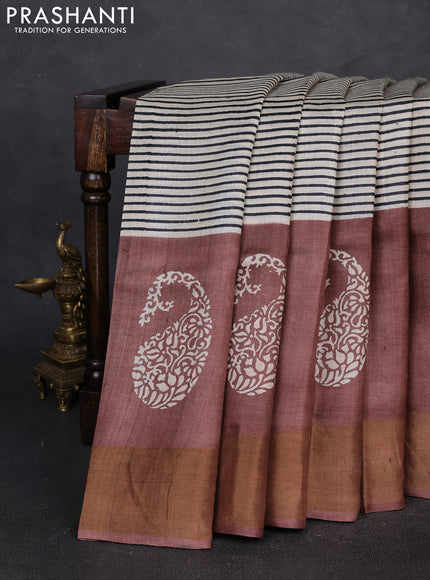 Pure tussar silk saree beige and pastel brown with allover stripe prints and long zari woven border
