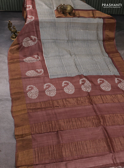 Pure tussar silk saree beige and pastel brown with allover stripe prints and long zari woven border