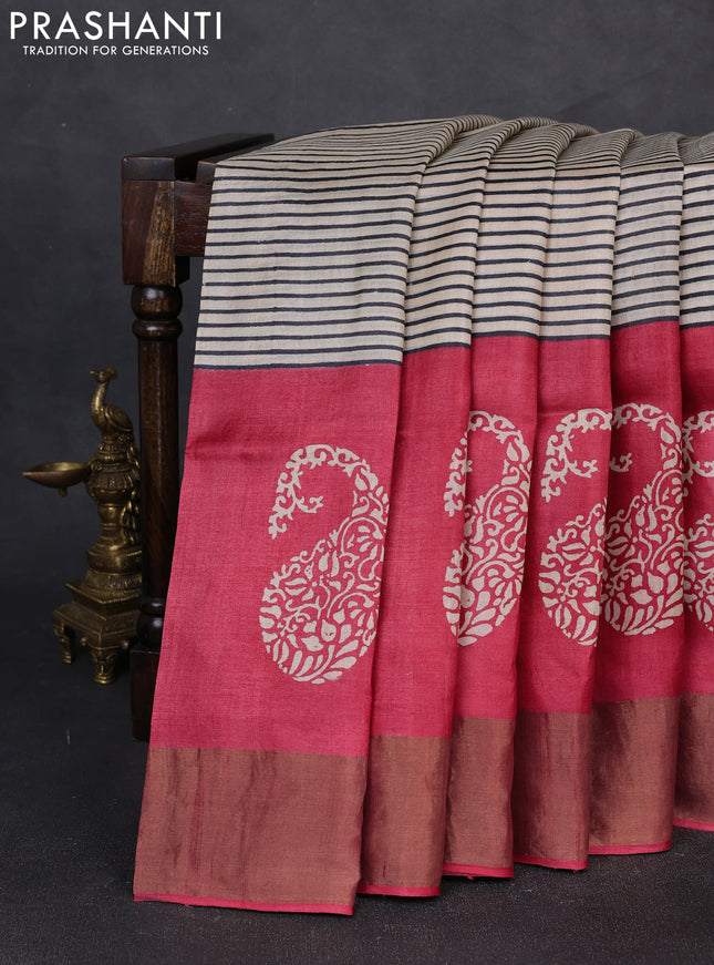 Pure tussar silk saree beige and tomato pink with allover stripe prints and long zari woven border