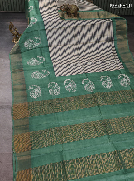 Pure tussar silk saree beige and pastel green with allover stripe prints and long zari woven border