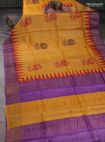 Pure tussar silk saree sunset orange and purple with floral butta prints and temple design zari woven border