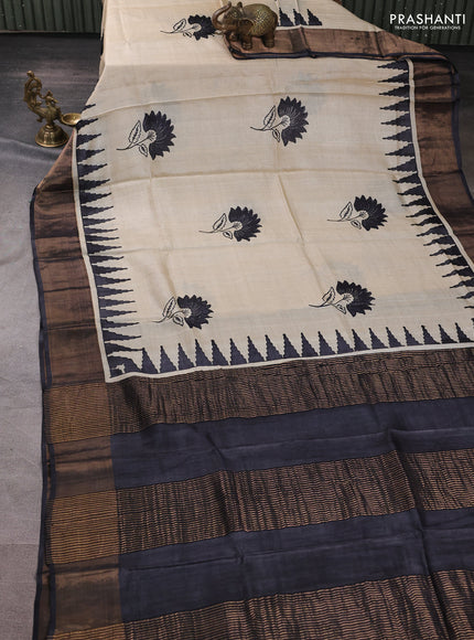 Pure tussar silk saree beige and black with floral butta prints and temple design zari woven border