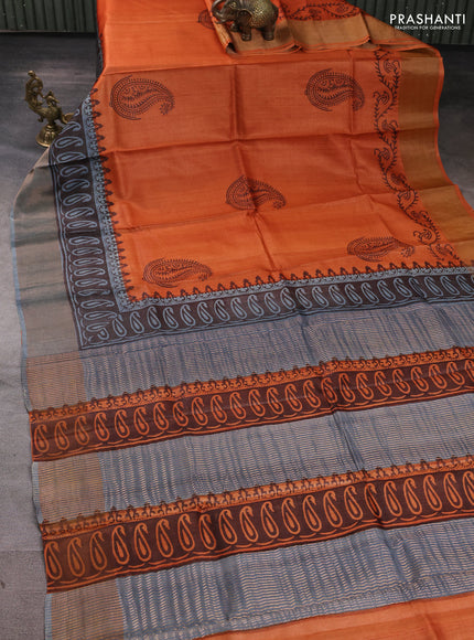Pure tussar silk saree rustic orange and grey with paisley butta prints and long printed zari woven border