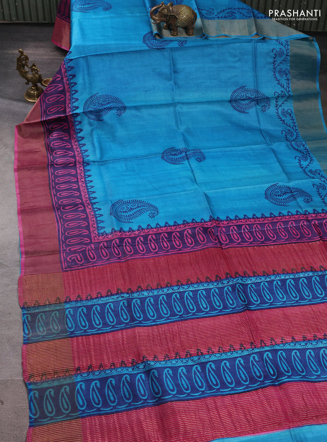 Pure tussar silk saree cs blue and pink with paisley butta prints and long printed zari woven border