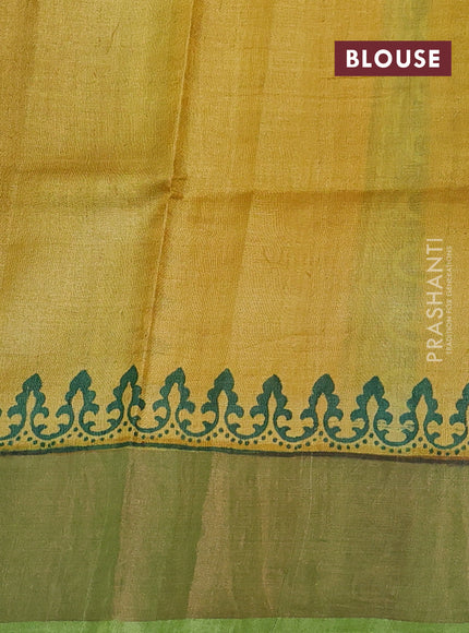 Pure tussar silk saree light green and mustard yellow with paisley butta prints and long printed zari woven border
