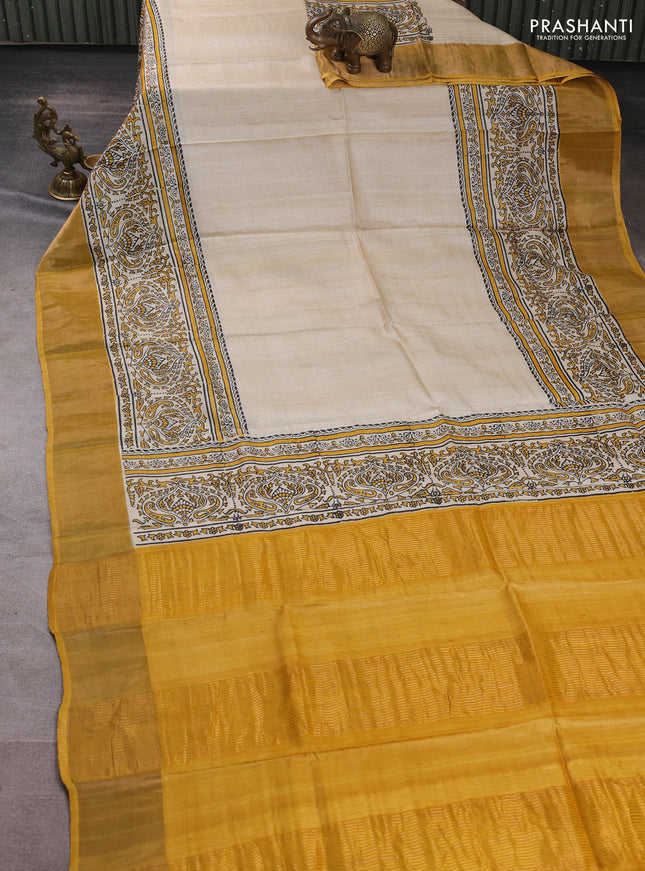 Pure tussar silk saree beige and mustard yellow with plain body and long printed zari woven border
