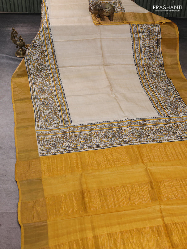 Pure tussar silk saree beige and mustard yellow with plain body and long printed zari woven border