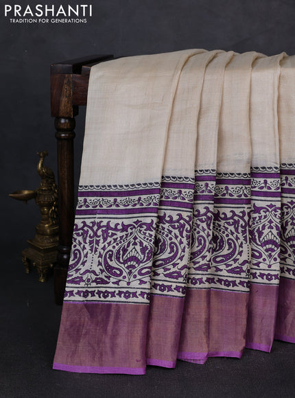 Pure tussar silk saree beige and purple with plain body and long printed zari woven border