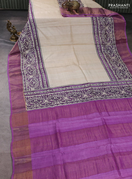 Pure tussar silk saree beige and purple with plain body and long printed zari woven border