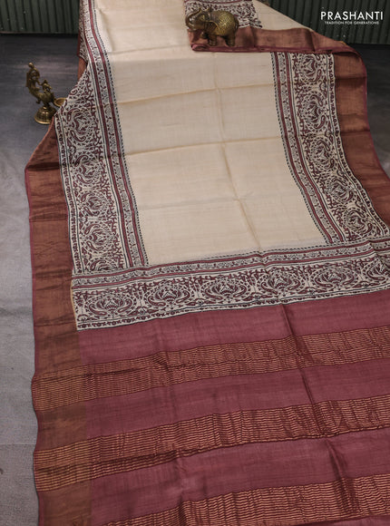Pure tussar silk saree beige and brown with plain body and long printed zari woven border