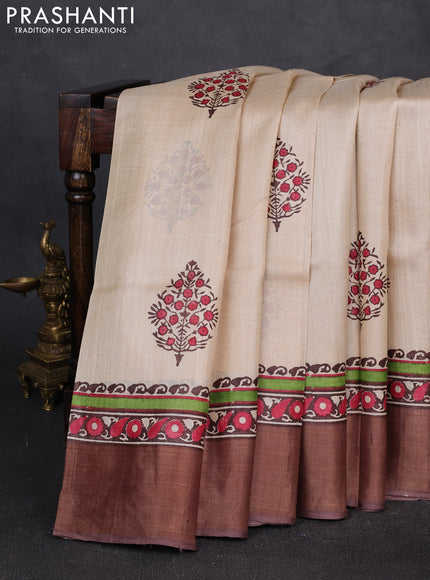 Pure tussar silk saree beige and brown with floral butta prints and zari woven border
