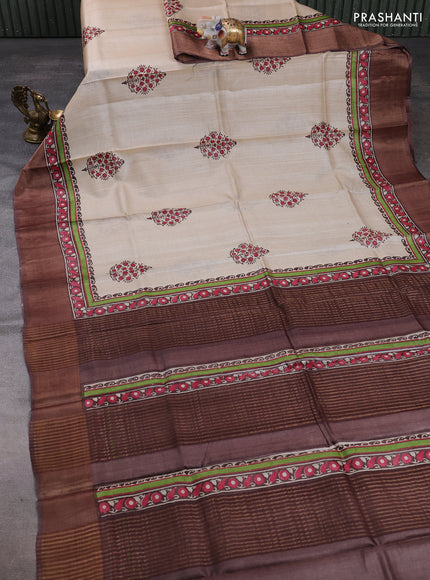 Pure tussar silk saree beige and brown with floral butta prints and zari woven border