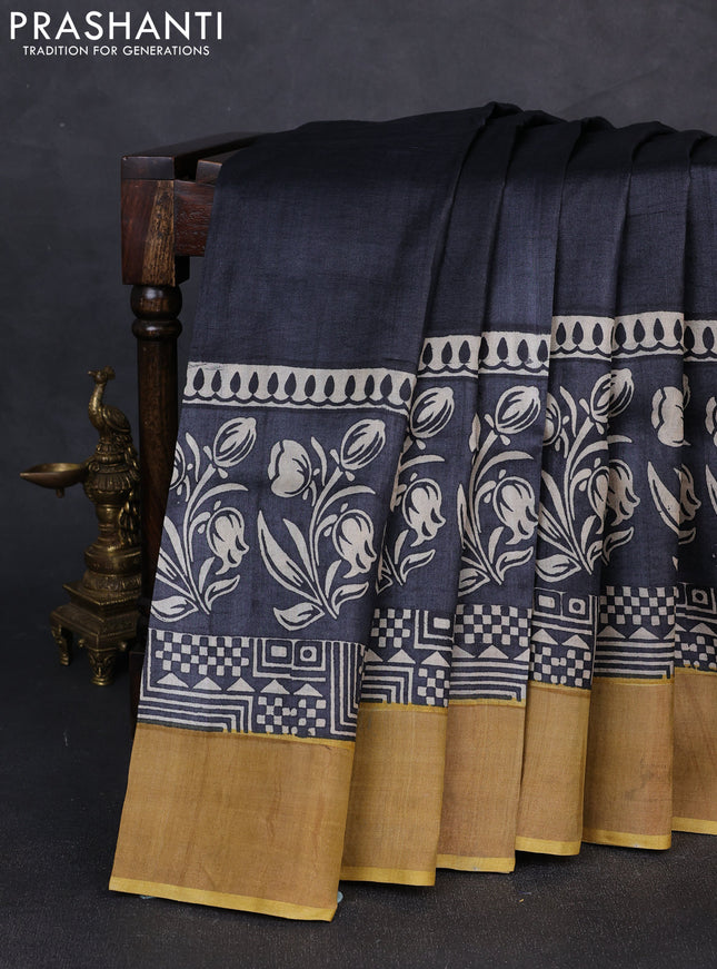 Pure tussar silk saree black and mustard yellow with plain body and long printed zari woven border