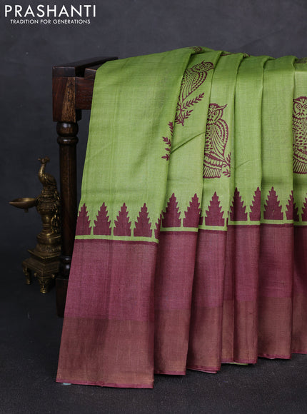 Pure tussar silk saree light green and rosy brown with butta prints and long temple design zari woven border