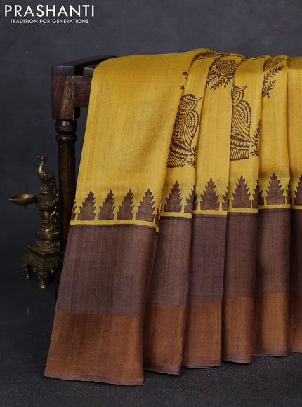 Pure tussar silk saree mustard yellow and coffee brown with butta prints and long temple design zari woven border