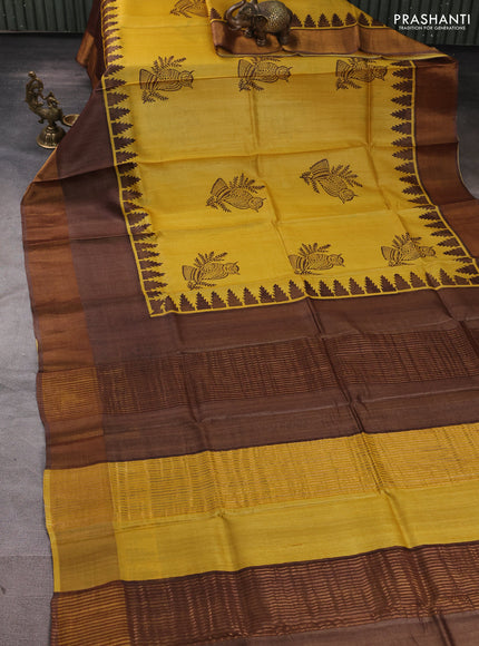 Pure tussar silk saree mustard yellow and coffee brown with butta prints and long temple design zari woven border