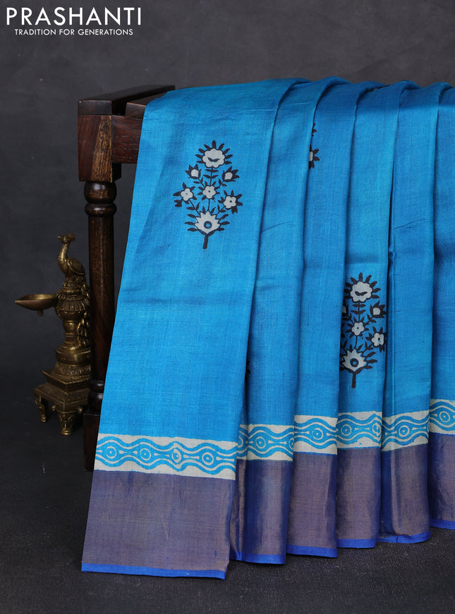 Pure tussar silk saree cs blue and indigo blue with floral butta prints and zari woven border