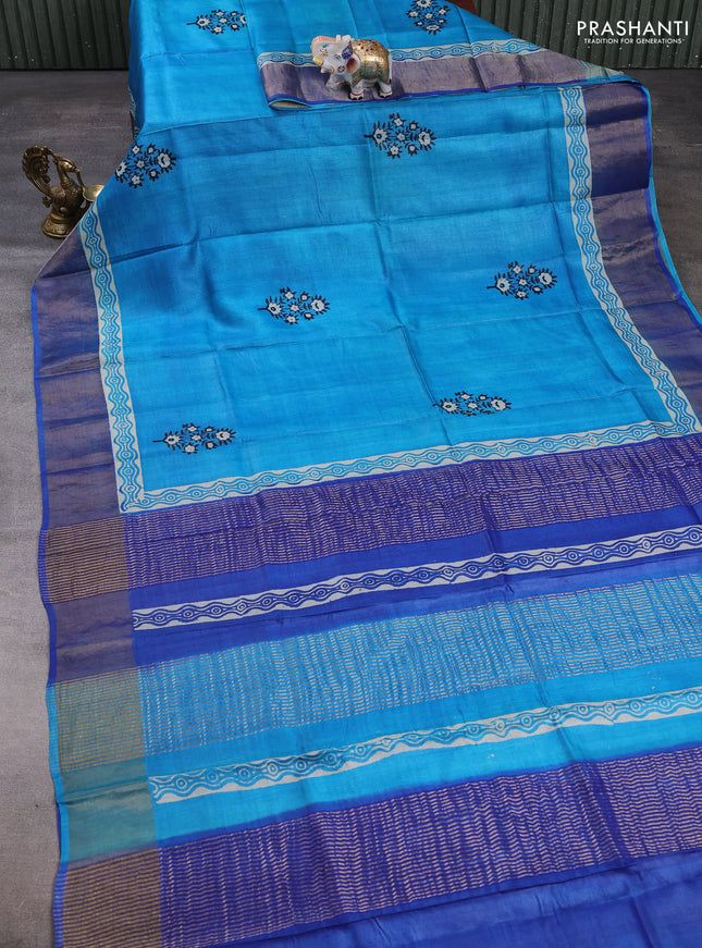 Pure tussar silk saree cs blue and indigo blue with floral butta prints and zari woven border