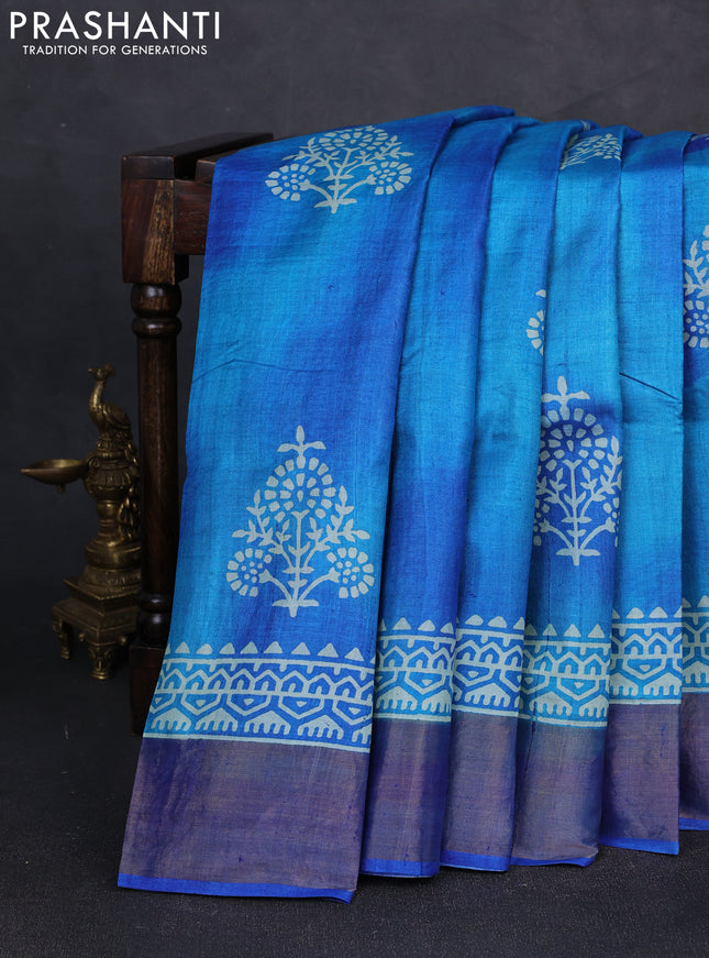 Pure tussar silk saree teal blue and blue with floral butta prints and zari woven border