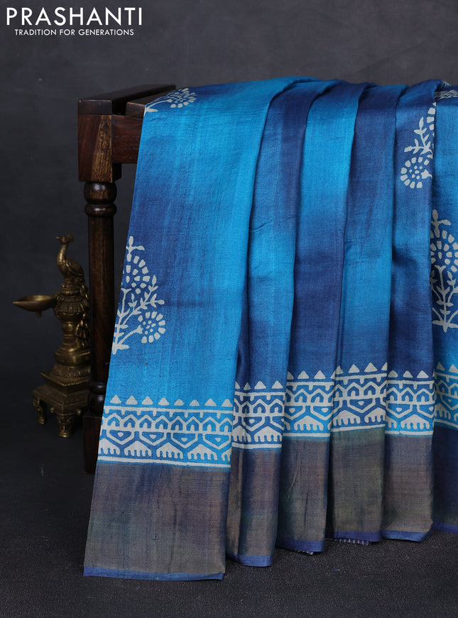 Pure tussar silk saree peacock blue with floral butta prints and zari woven border