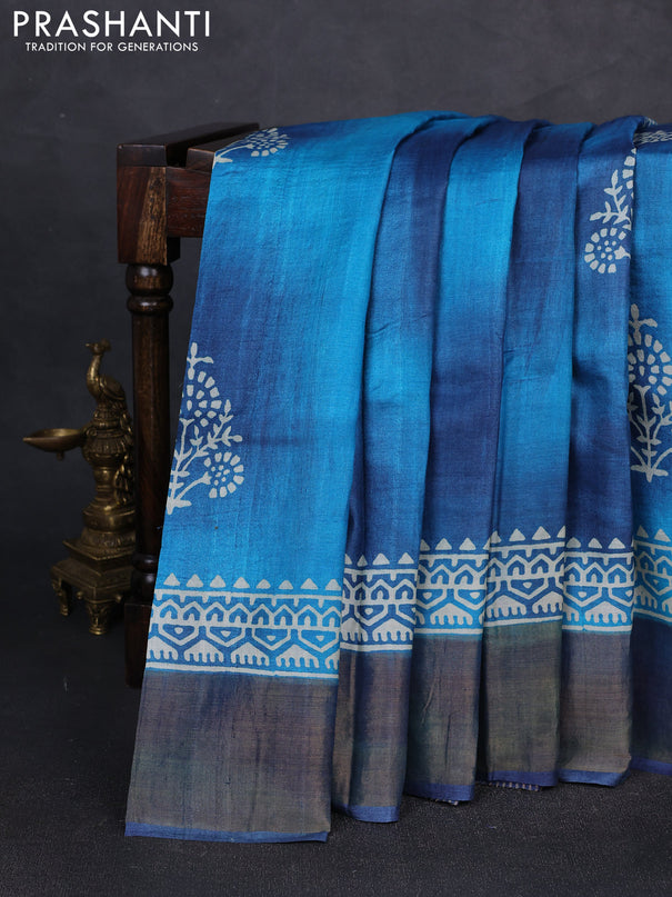 Pure tussar silk saree peacock blue with floral butta prints and zari woven border