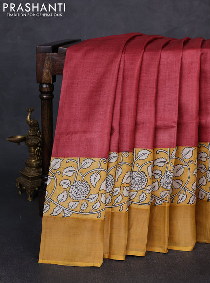 Pure tussar silk saree maroon and mustard yellow with plain body and long printed zari woven border