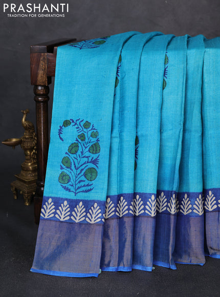 Pure tussar silk saree teal blue and blue with floral butta prints and zari woven border