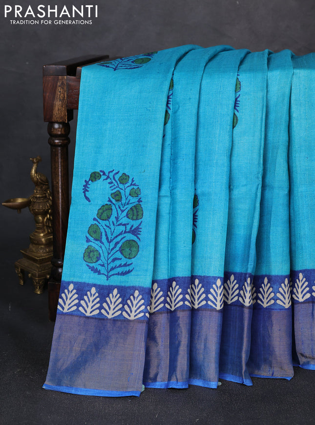 Pure tussar silk saree teal blue and blue with floral butta prints and zari woven border