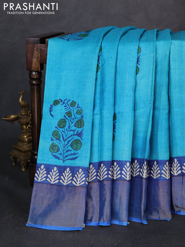 Pure tussar silk saree teal blue and blue with floral butta prints and zari woven border