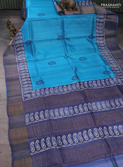 Pure tussar silk saree cs blue and grey with plain body and long printed zari woven border