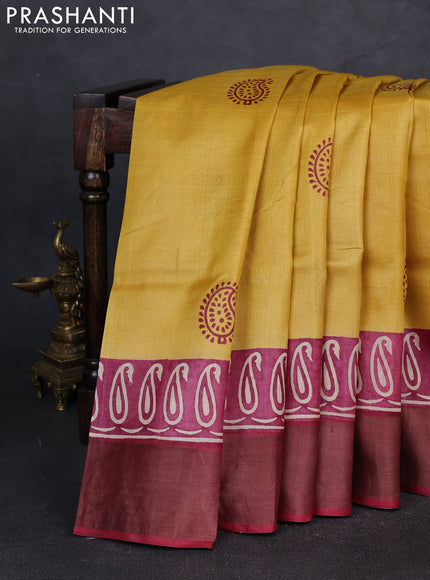 Pure tussar silk saree mustard yellow and maroon with paisley butta prints and long printed zari woven border