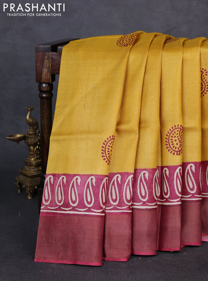 Pure tussar silk saree mustard yellow and maroon with paisley butta prints and long printed zari woven border