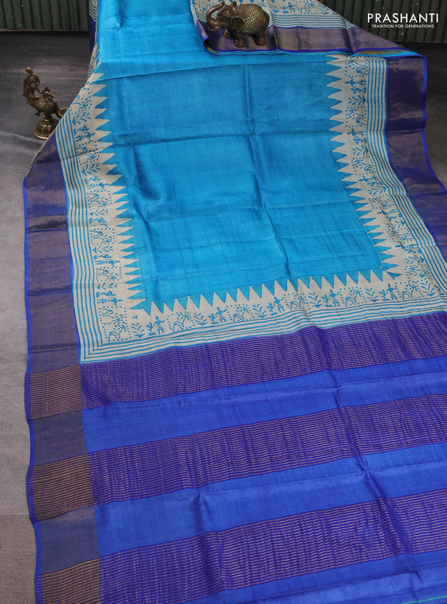 Pure tussar silk saree cs blue and indigo blue with plain body and warli prints