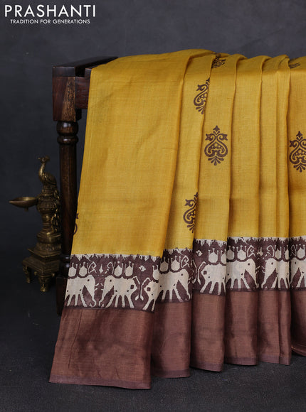 Pure tussar silk saree mustard yellow and coffee brown with butta prints and patola printed zari woven border