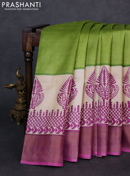 Pure tussar silk saree light green and purple with plain body and long printed zari woven border