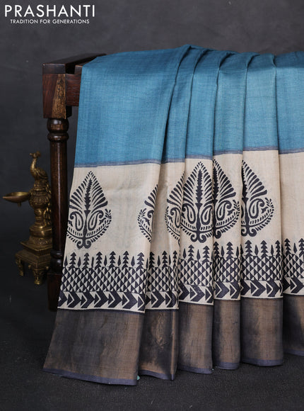 Pure tussar silk saree pastel blue and beige black with plain body and long printed zari woven border