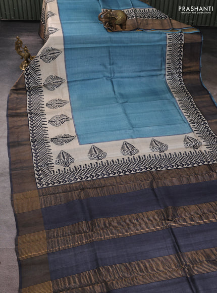 Pure tussar silk saree pastel blue and beige black with plain body and long printed zari woven border