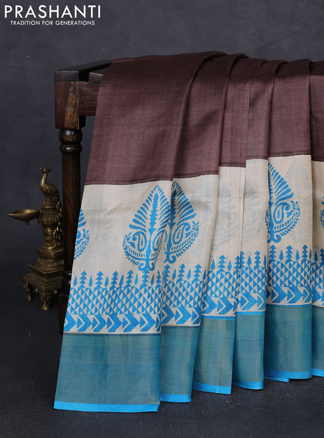 Pure tussar silk saree coffee brown and beige cs blue with plain body and long printed zari woven border