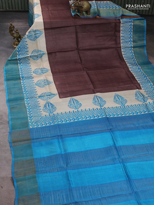 Pure tussar silk saree coffee brown and beige cs blue with plain body and long printed zari woven border