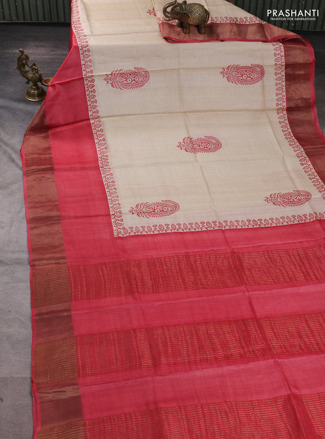 Pure tussar silk saree beige and tomato pink with paisley butta prints and long simple zari woven border