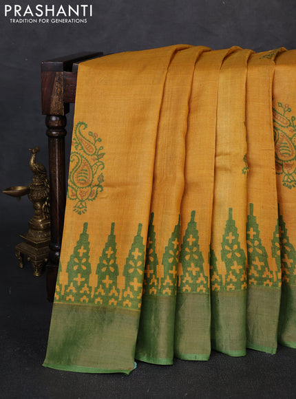 Pure tussar silk saree mustard yellow and green with paisley butta prints and temple design zari woven border